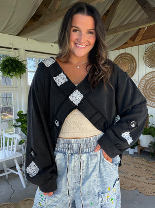 The Criss Cross Peace Pullover - BLACK